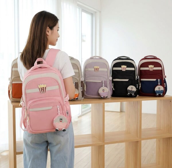 Mochilas juveniles en varios colores con monedero colgante